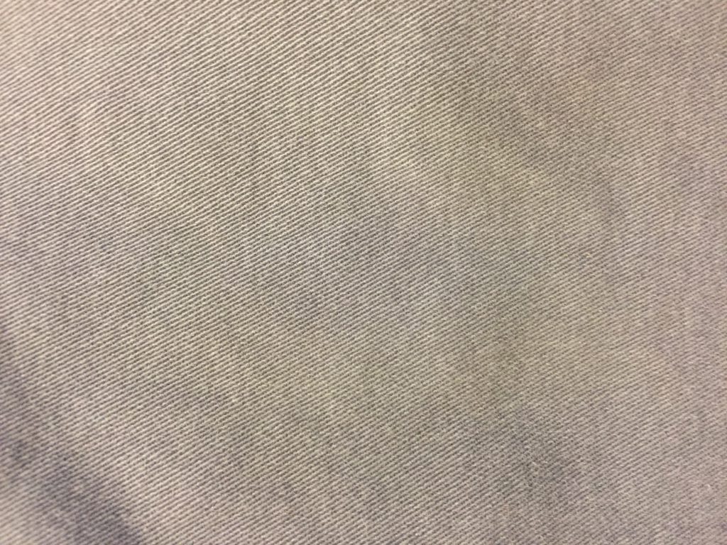Light grey fabric close up with diagonal lines