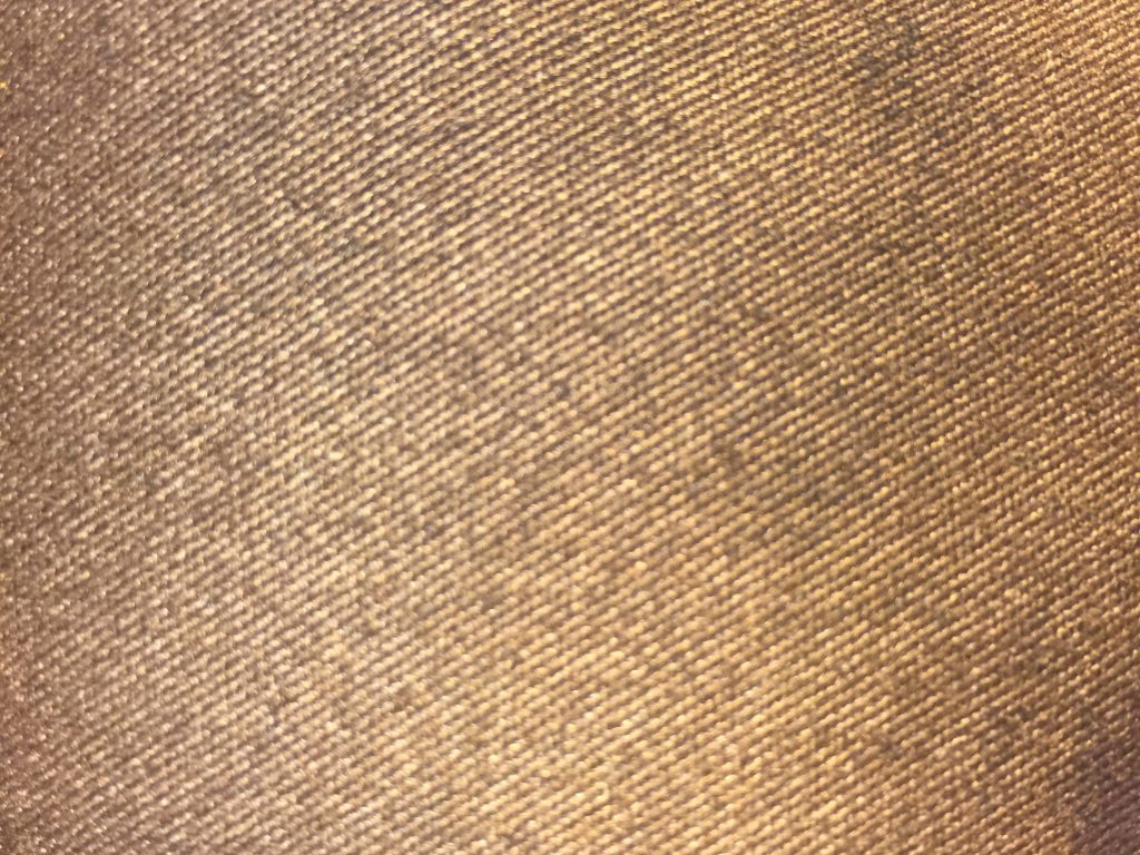 Metallic gold fabric with diagonal lines