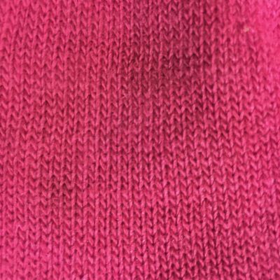Loosely knitted fabric from a pink glove