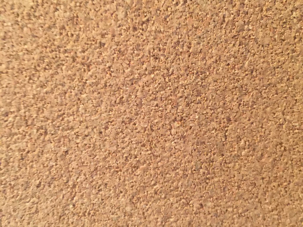 Tan cork board with lots of texture