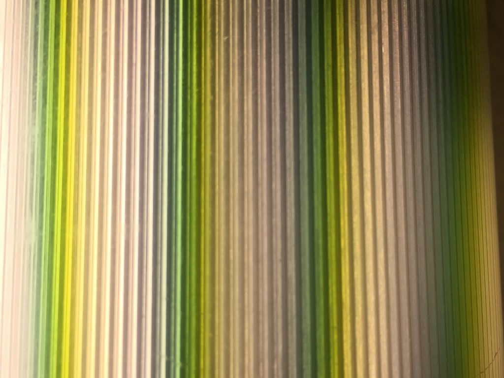 Vivid green and yellow lines of color