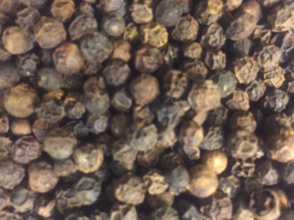 Pepper balls close up with range of browns and texture