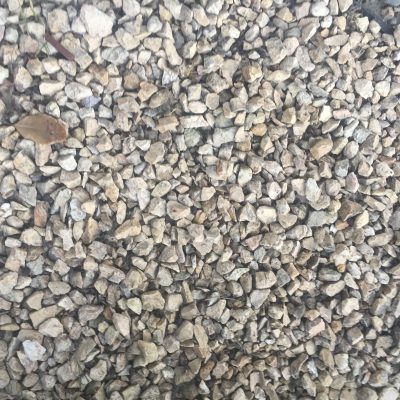 White gravel with leaf