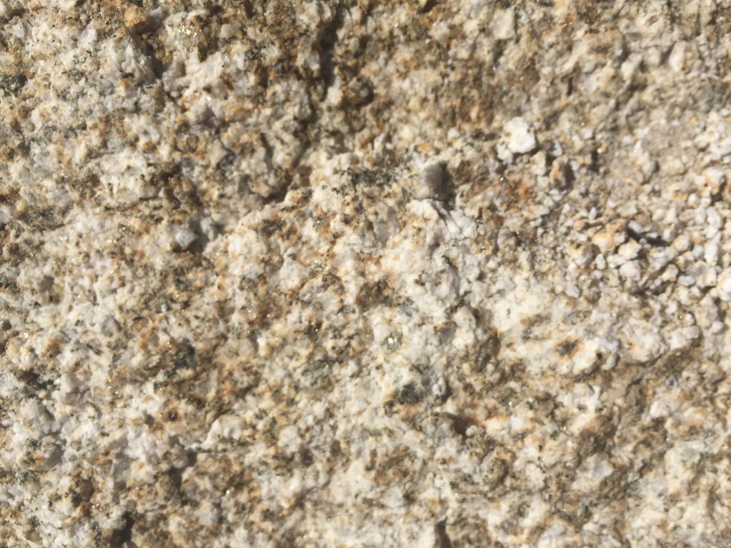 Bumpy granite rock close up stock texture