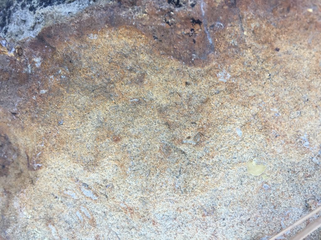 Rust colored noisy rock texture