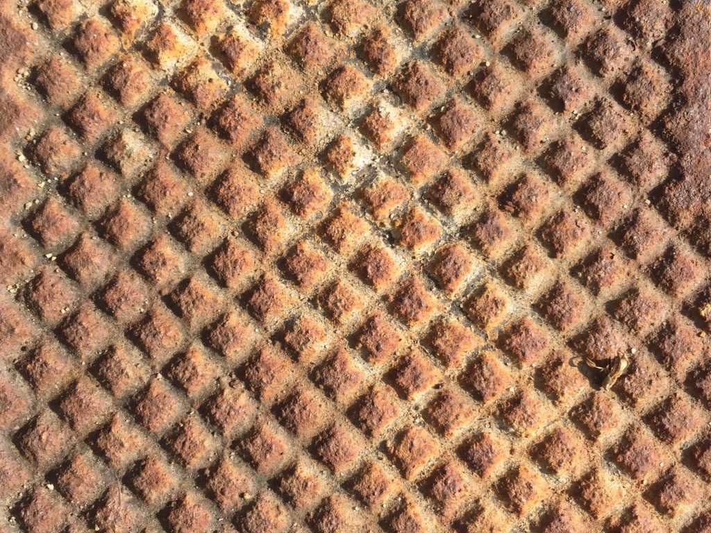 Heavy rust metal with pattern of squares