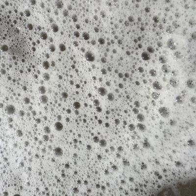 White sea foam close up with bubbles