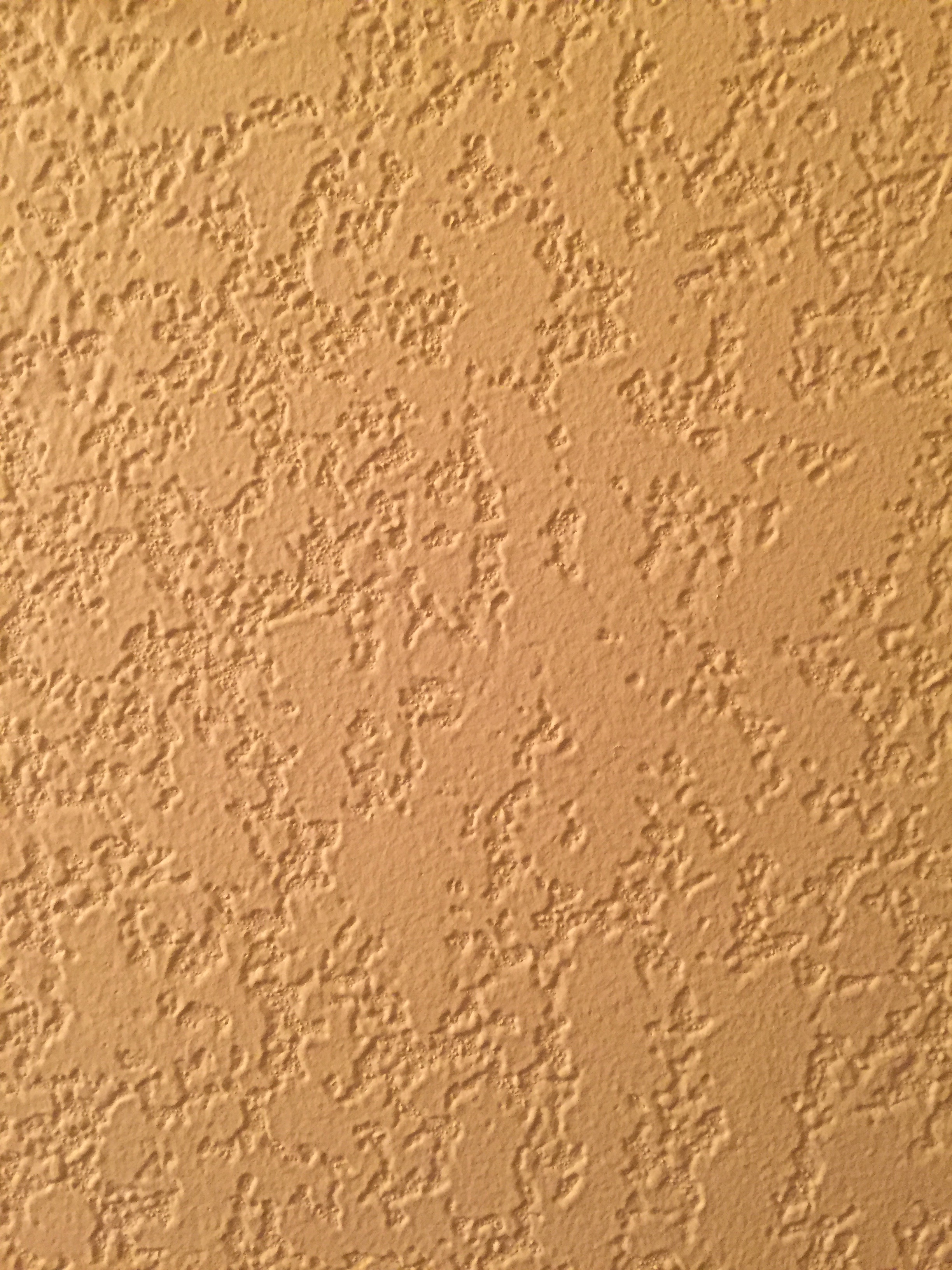 yellow-paint-on-textured-stucco-wall-free-textures