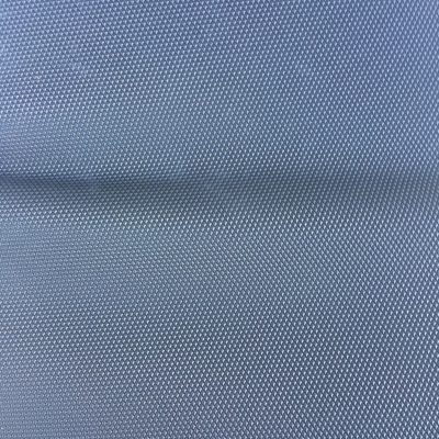 Blue vinyl upholstery with diamond pattern