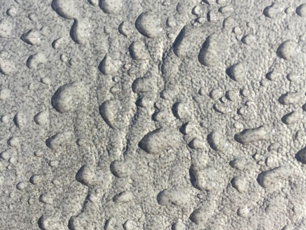 Leather like material with water droplets