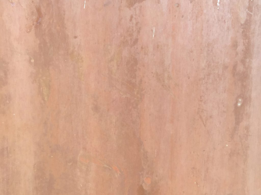 Rusted metal wall with medium red/brown color