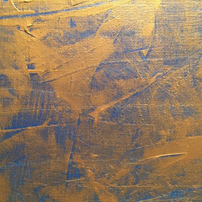 Gold paint over bright blue with canvas texture showing through