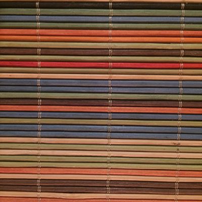 Colorful thin wood slats stacked vertically