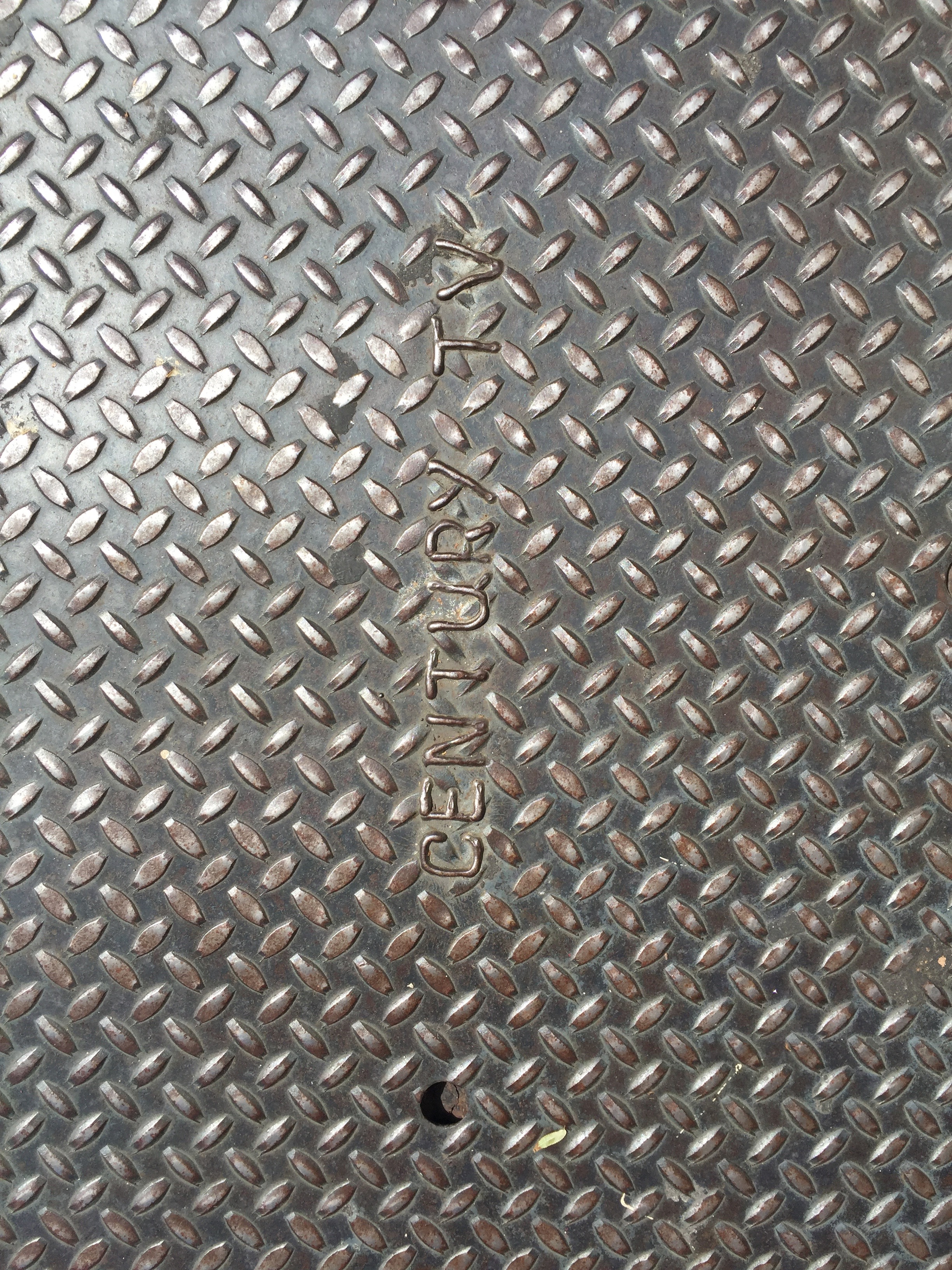 Metal plate with pattern and some rust | Free Textures