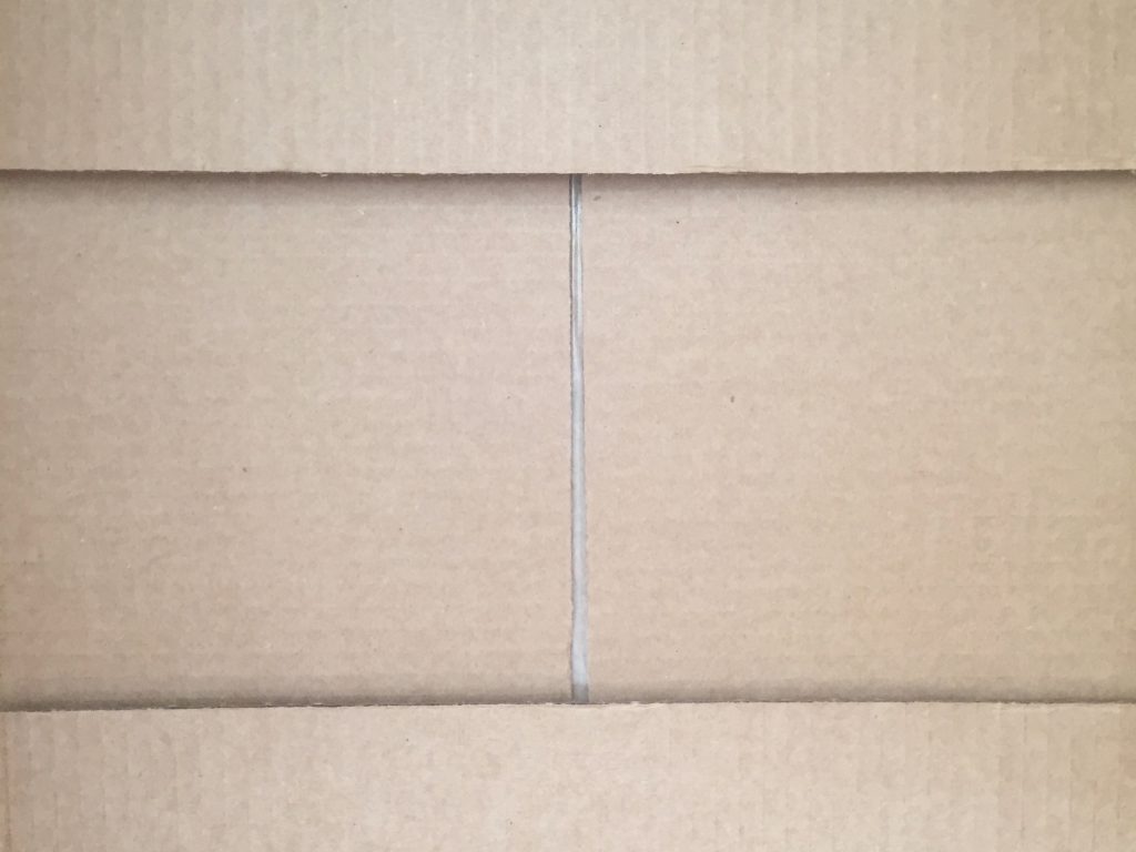 Light brown cardboard box folds