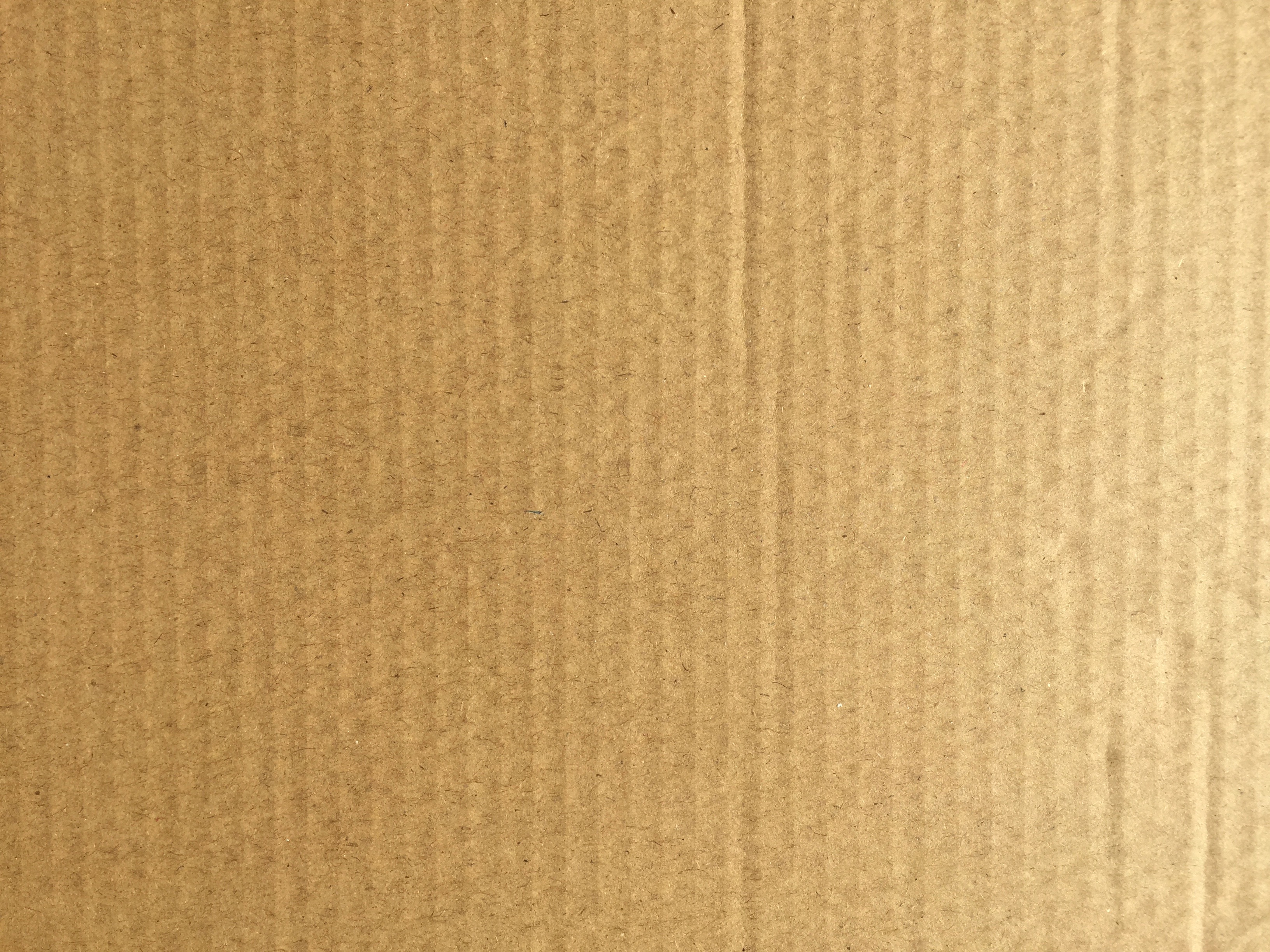 Golden brown corrugated cardboard paper