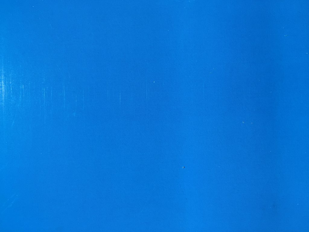 Semi-gloss blue paper with white lines on left