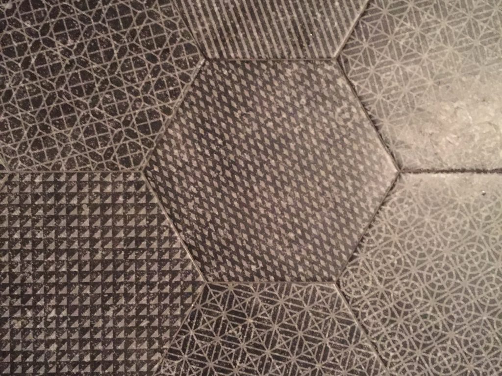 Charcoal grey hexagonal tiles