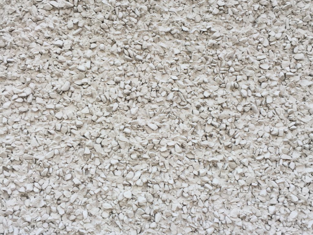 Wall covered in white rocks
