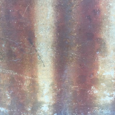 Grunge shot of concrete with dark rust stains