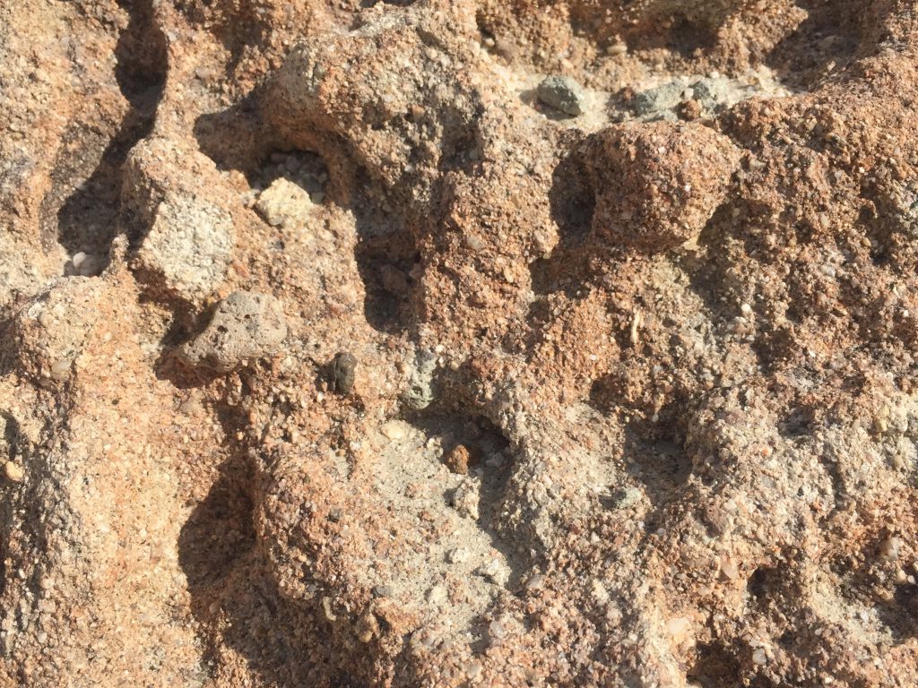 Gritty texture close up on composite lava rock