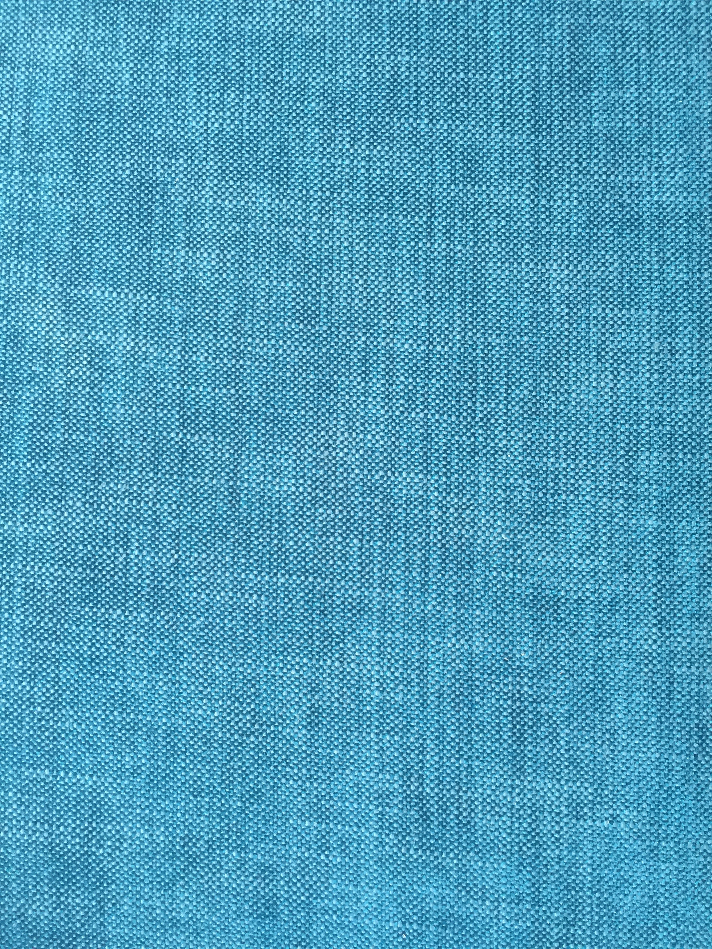 Close up of bright blue fabric texture