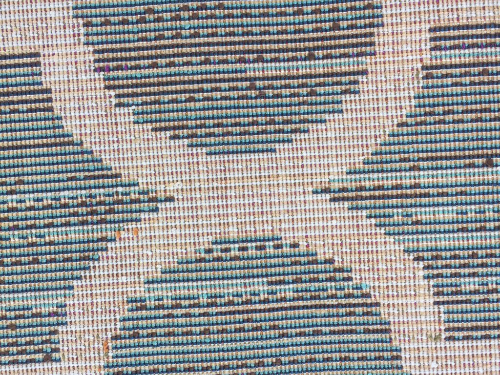 Pattern of squares on backside of carpet