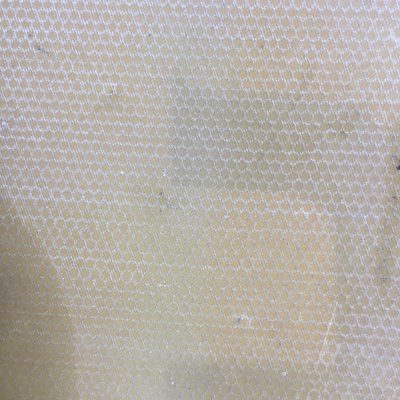 Hard plastic base with white honeycomb pattern