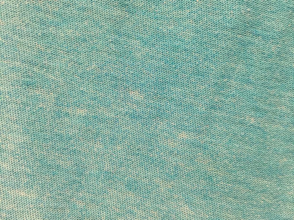 Teal fabric with loosely knit pattern