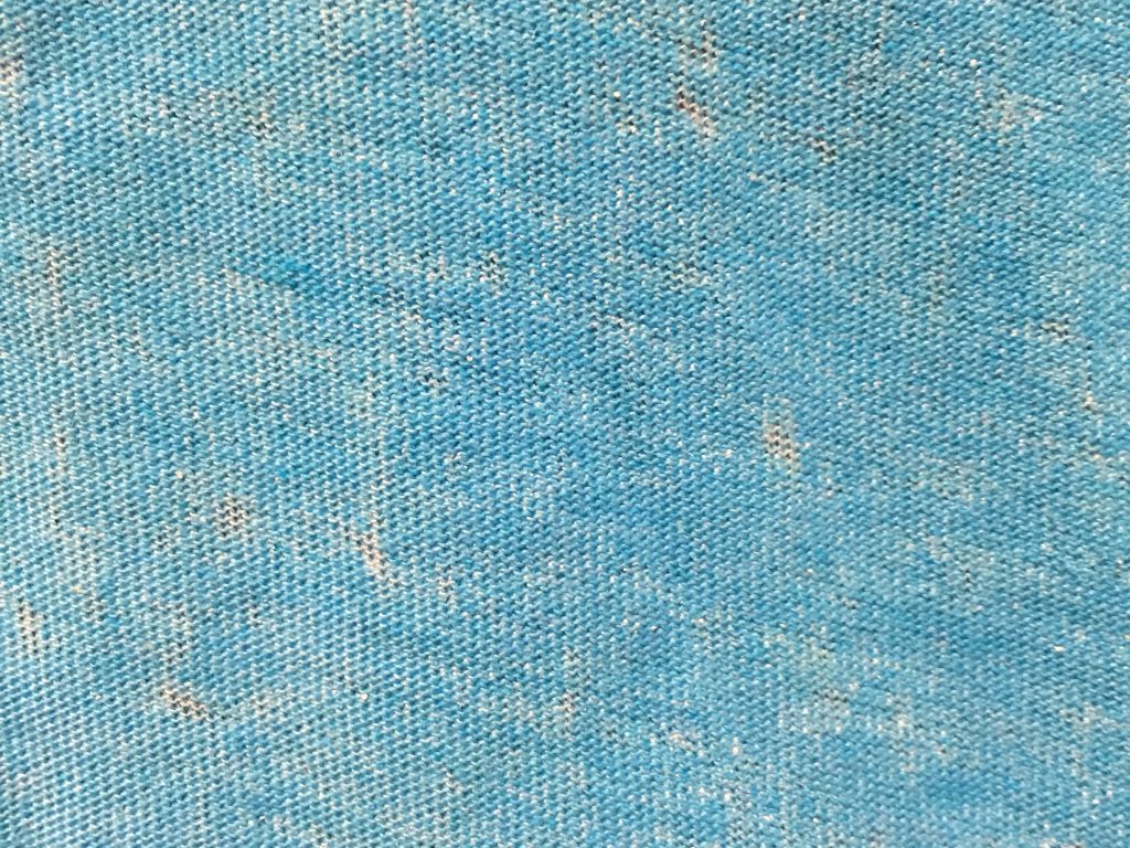 Close up of blue fabric