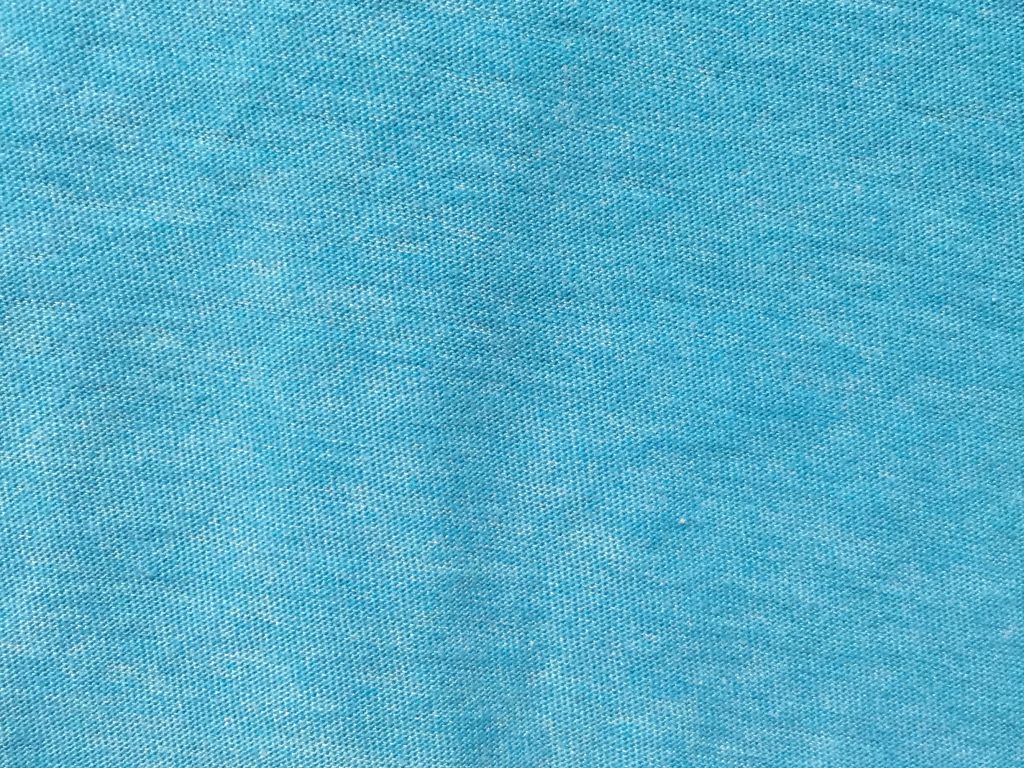 Baby blue fabric close up