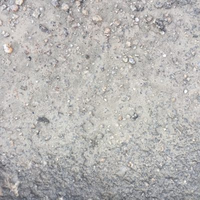 Rocky surface with dirt and loose rocks
