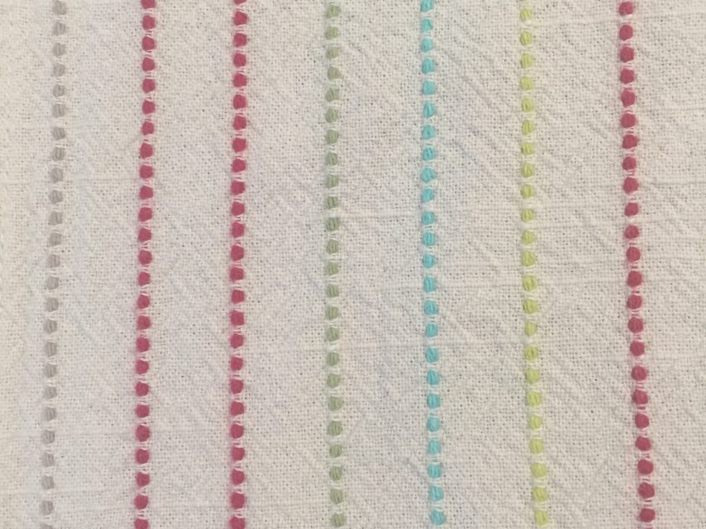 Embroidered cloth with colorful vertical lines