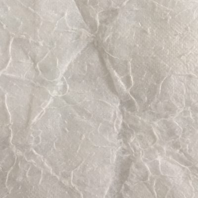 Worn out white fabric