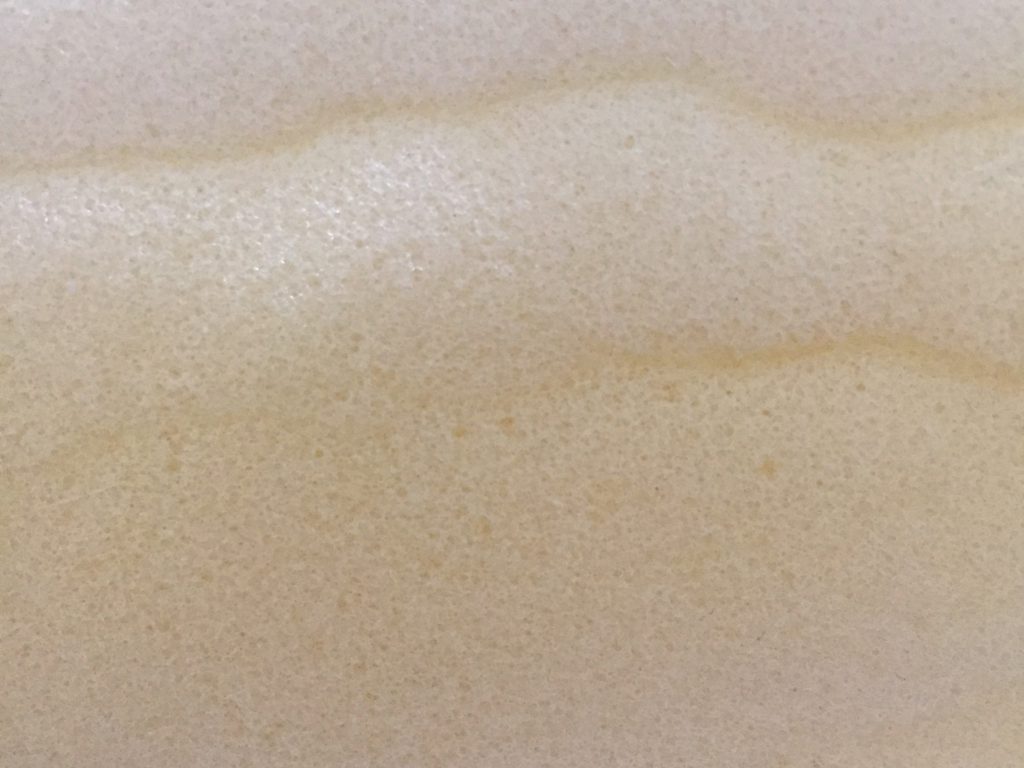 Off white foam close up