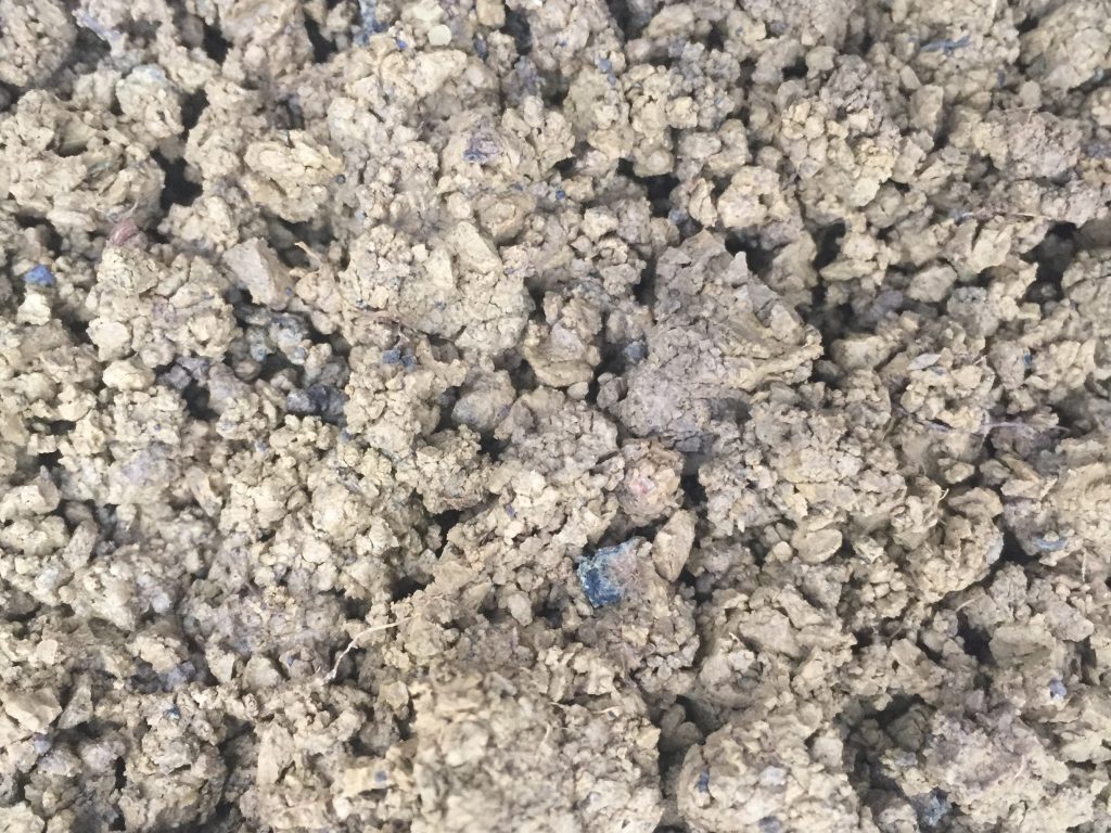 Light brown clumps of dirt