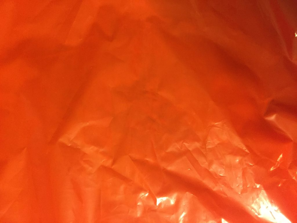 Bright burnt orange plastic