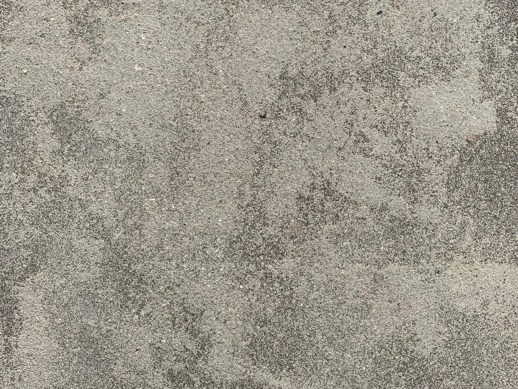 Grey concrete with rough surface