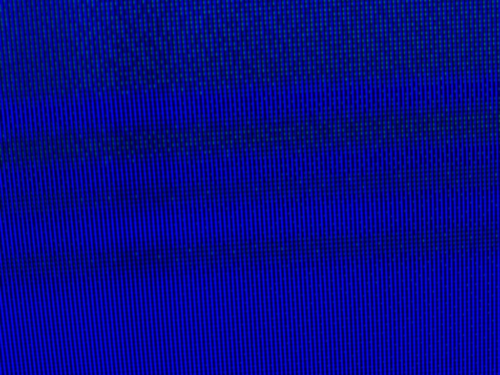 Thousands of bright blue pixels at slight angle