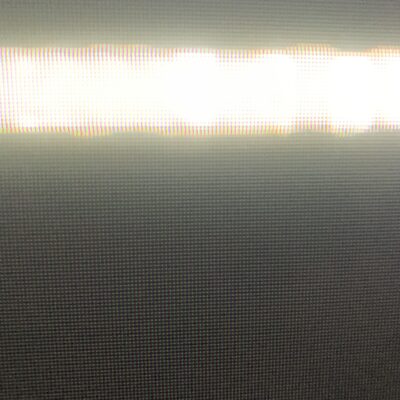 Bright white streak across dark grey LED pixel grid
