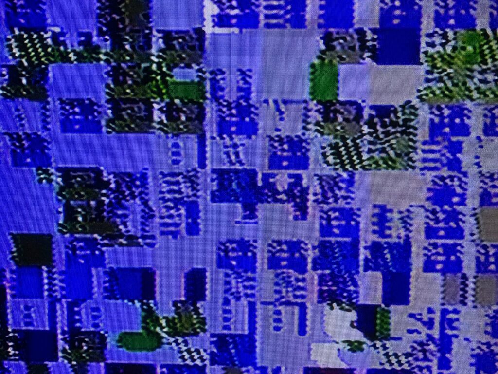 Retro video game tile glitching with purple color