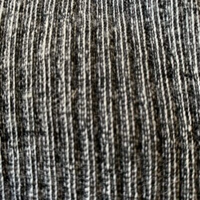 Charcoal gray wool close up stitching