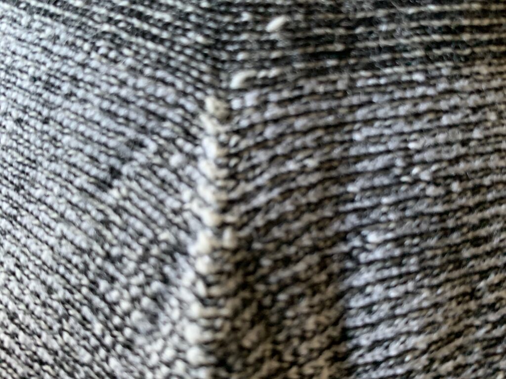 Black and white wool fabric close up