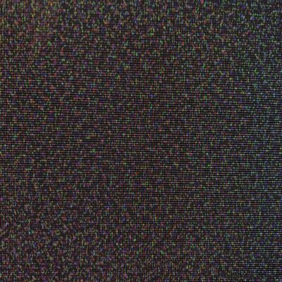 Purple, green and blue pixels spread over tv screen