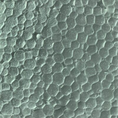 Light teal cellular pattern on foam