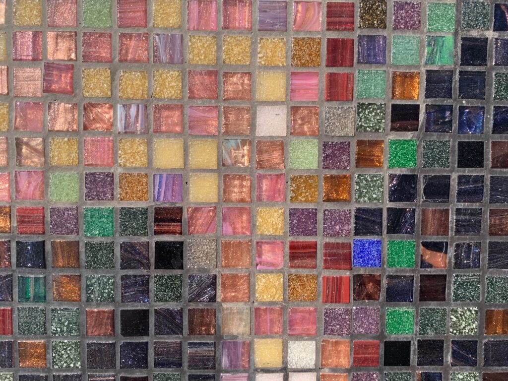 Colorful tiles with gray grout