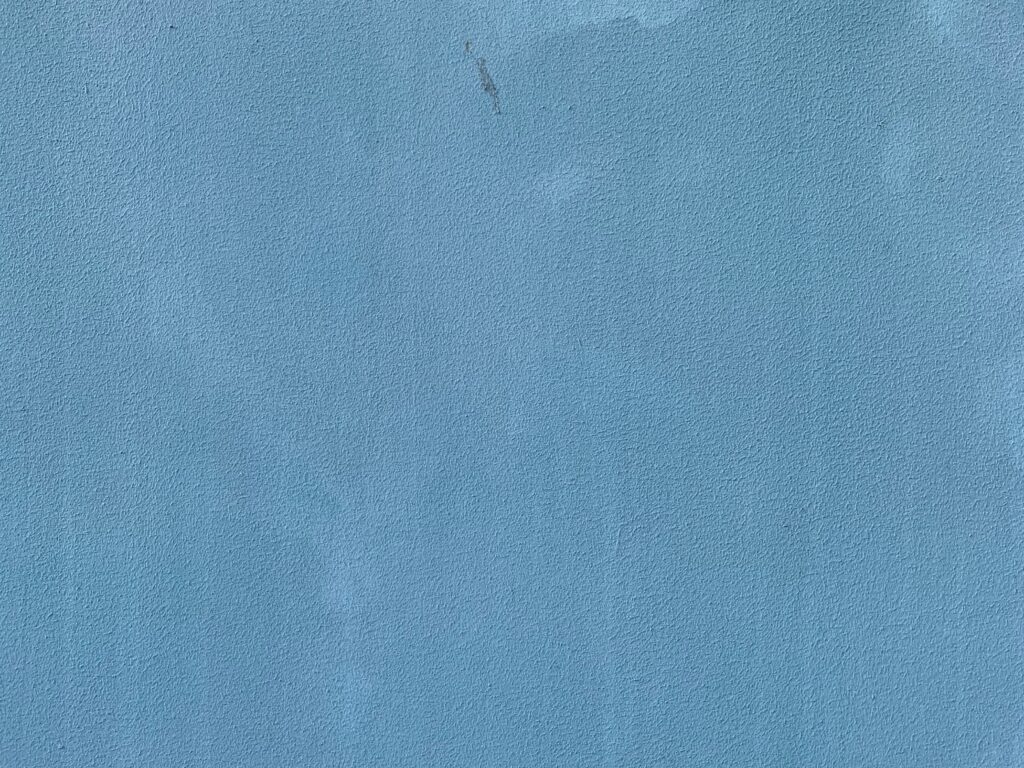 Coarse light navy blue wall