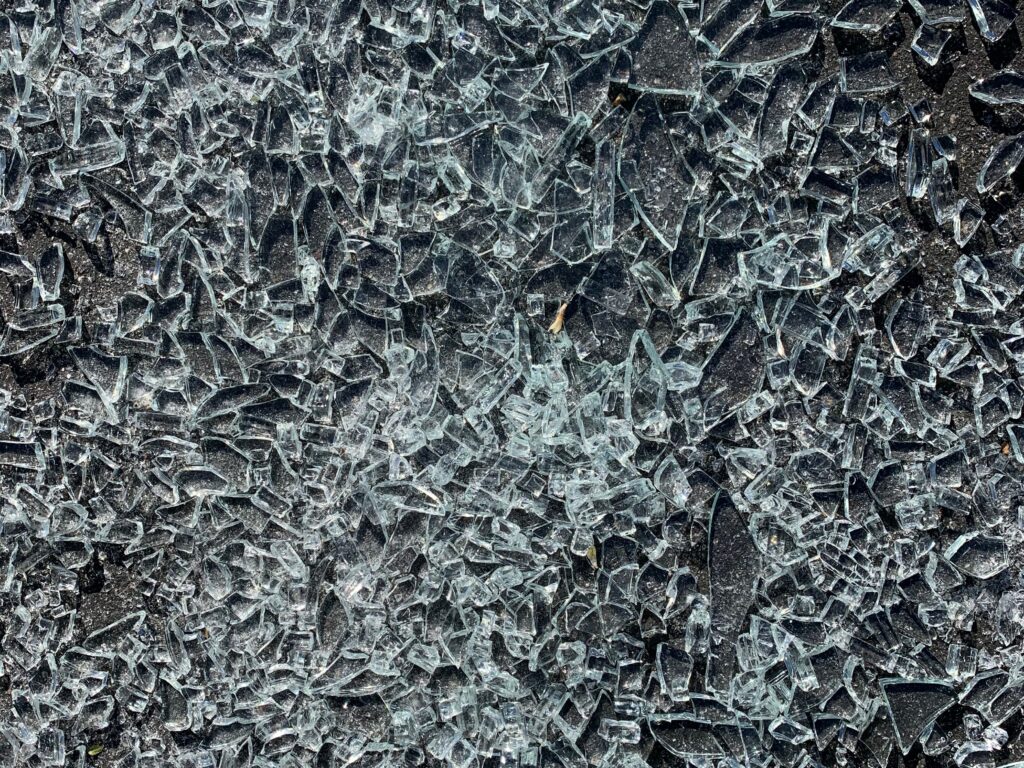 Close up of crunched glass on street