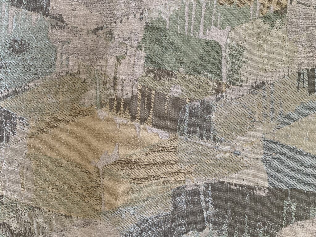 Patches of color on couch upholstery