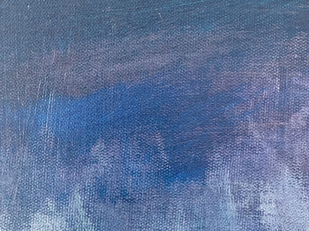 Blue brush strokes over canvas